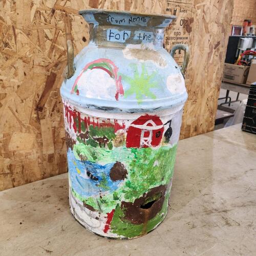 Painted milk can w holes