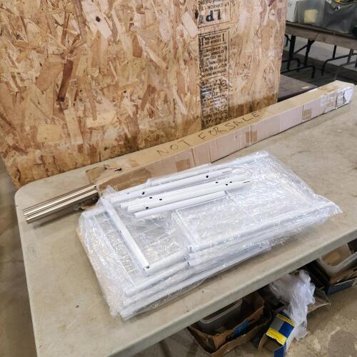 Unused curtain rods & shelving