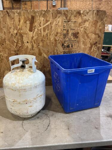 Empty Bbq propane tank, recycle bin
