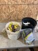 2 buckets of electric fencing insulators