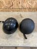 2 small motorcycle helmets