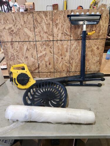 Rolling stand, tractor seat, electric leaf blower, roll of plastic