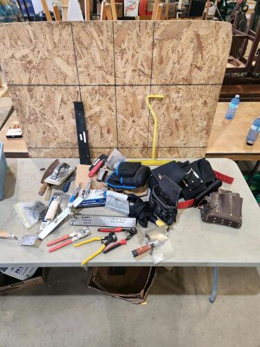 Assorted drywalling tools