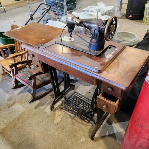 Singer sewing machine in cabinet