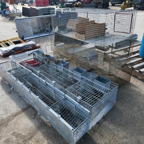 Various sized used rabbit cages