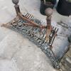 Park bench end, fireplace log holder, etc.