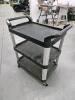 28"L 20"W 34"H Plastic rolling cart