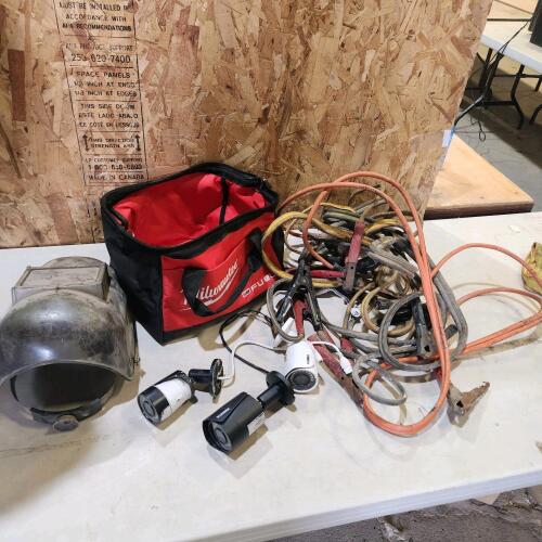Security cameras, booster cables, welding helmet