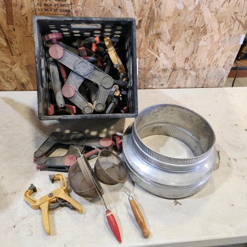 Assorted clamps, strainers, Chimney pipe