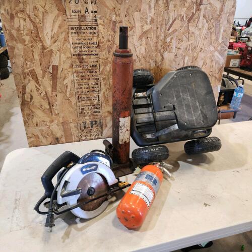 Bottle jack, circular saw, discharged fire extinguisher