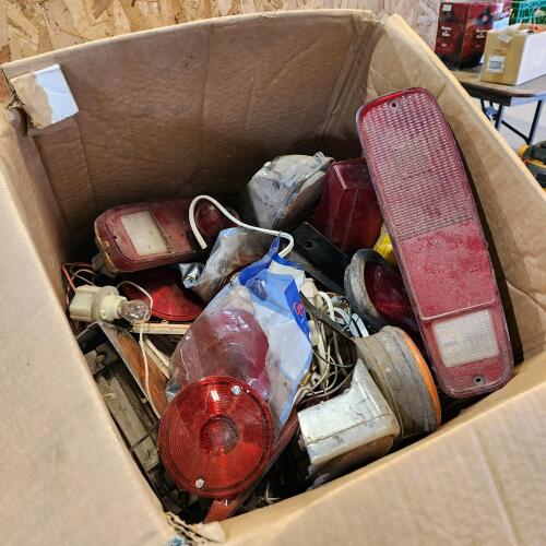 Box of assorted trailer accessories
