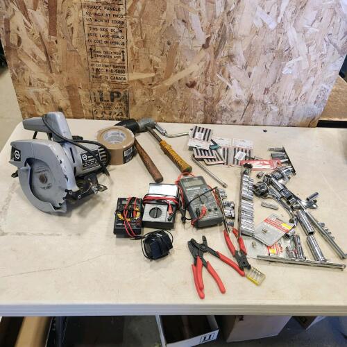 Circular saw, multimeters, assorted sockets, etc.