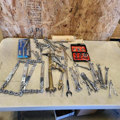 Assorted wrenches, torch heads