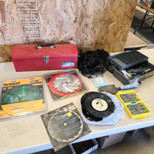 Saw blades, 45 RPM records, toolbox, assorted tools