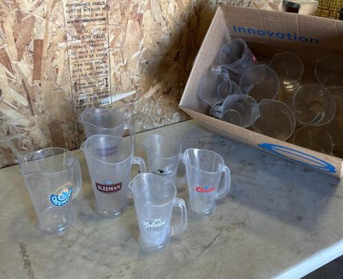 Assorted plastic beer pitchers