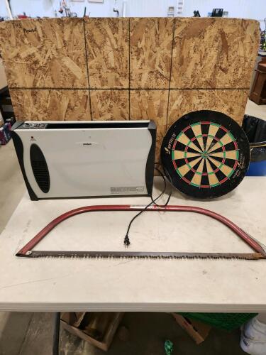 Crosscut saw, dart board, heater