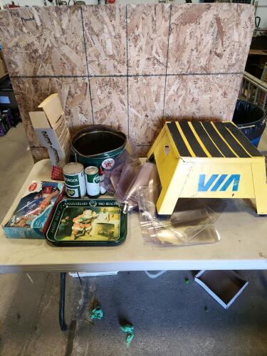 Vintage oil tins, coca cola memorabilia, via rail stool