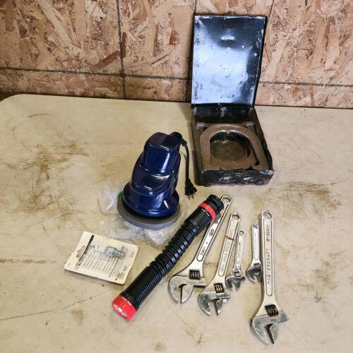 Car buffer, flashlight, adj wrenches, horse shoes
