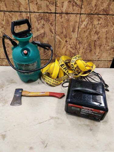 2" Ratchet strap, battery charger, 2gal sprayer, hatchet