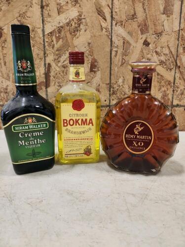 3 Sealed bottles of vintage liquor