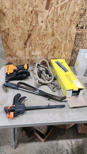 Air coil nailer, quick clamps, pry bars, tile cutter