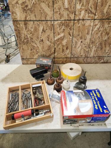 Drill bits, third brake light, oil tins, etc
