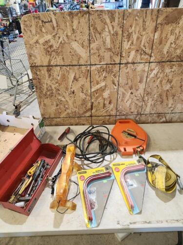 Booster cables, shelf brackets, hose on reel