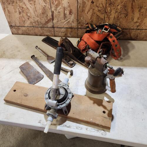 Blow torch, planes, safety harness