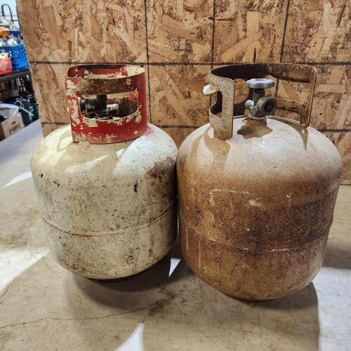 2 Propane tanks w some in it