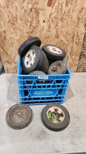 Crate of lawnmower wheels