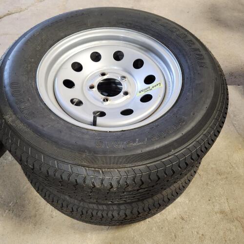 2 205/75R15 trailer wheels as new