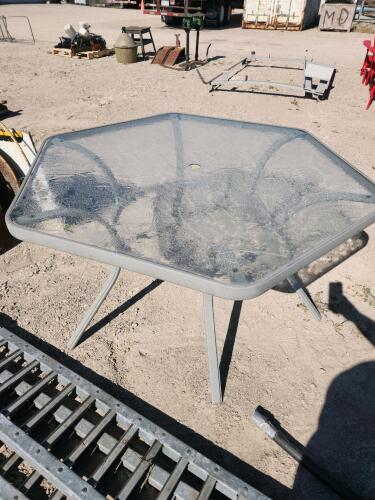 54"w x 27"H Glass top patio table