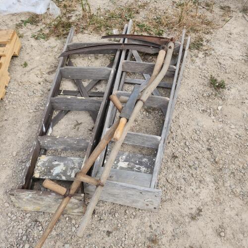 2 5' wooden step ladders, 2 wooden handled scythes