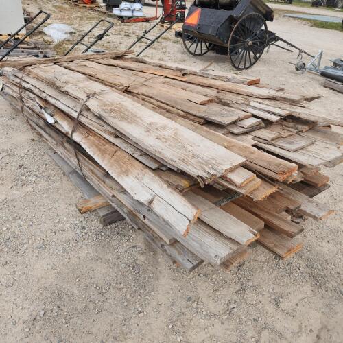 Lift of various sized barn board