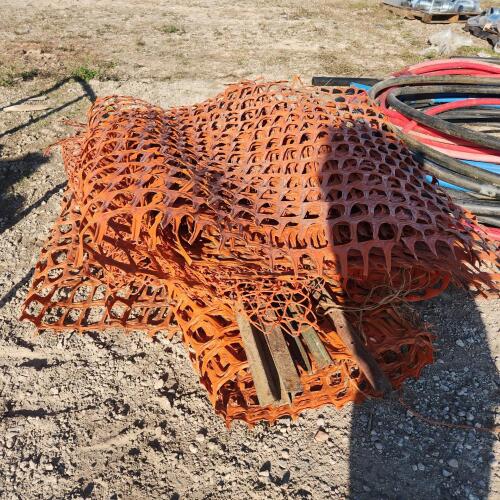 Rolls of plastic snow fence