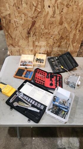 Router bits, stud finder, various tools