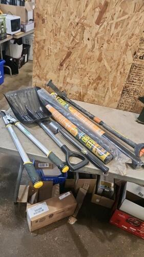 Landscape fabric, shovel, weeder