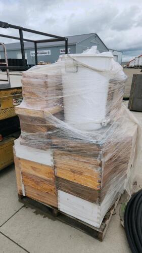 Skid of bee keeping equipment