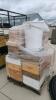 Skid of bee keeping equipment
