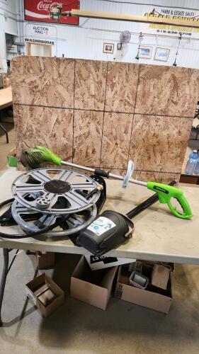 Electric string trimmer, wall mount hose reel