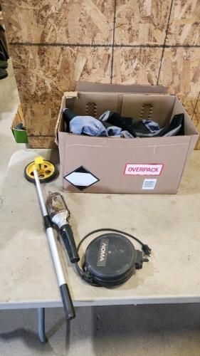 Measuring wheel, retractable trouble light