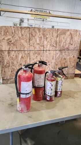1 Charged & 3 discharged fire extinguishers
