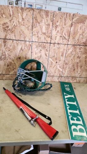 Toy gun, swing, metal sign