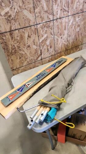 Army cot, hockey memorabilia