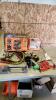 Booster cables, tool set, sprinkler, etc.