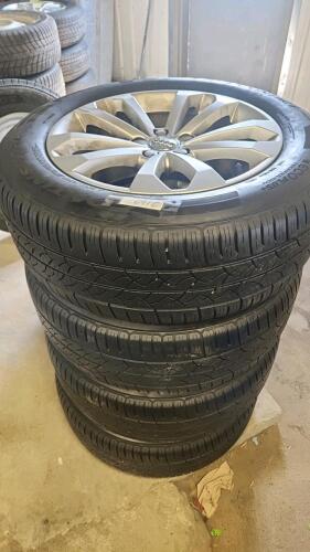235/60R18 Tires alum Audi rims 40% tread