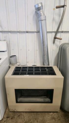Gas heater w vent pipes