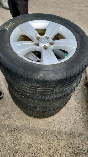 4- 225/65R17 alum wheels, tires shot