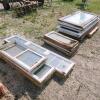 Various sized used windows & doors