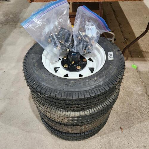 4 New 5.3-12 Trailer tires w hubs